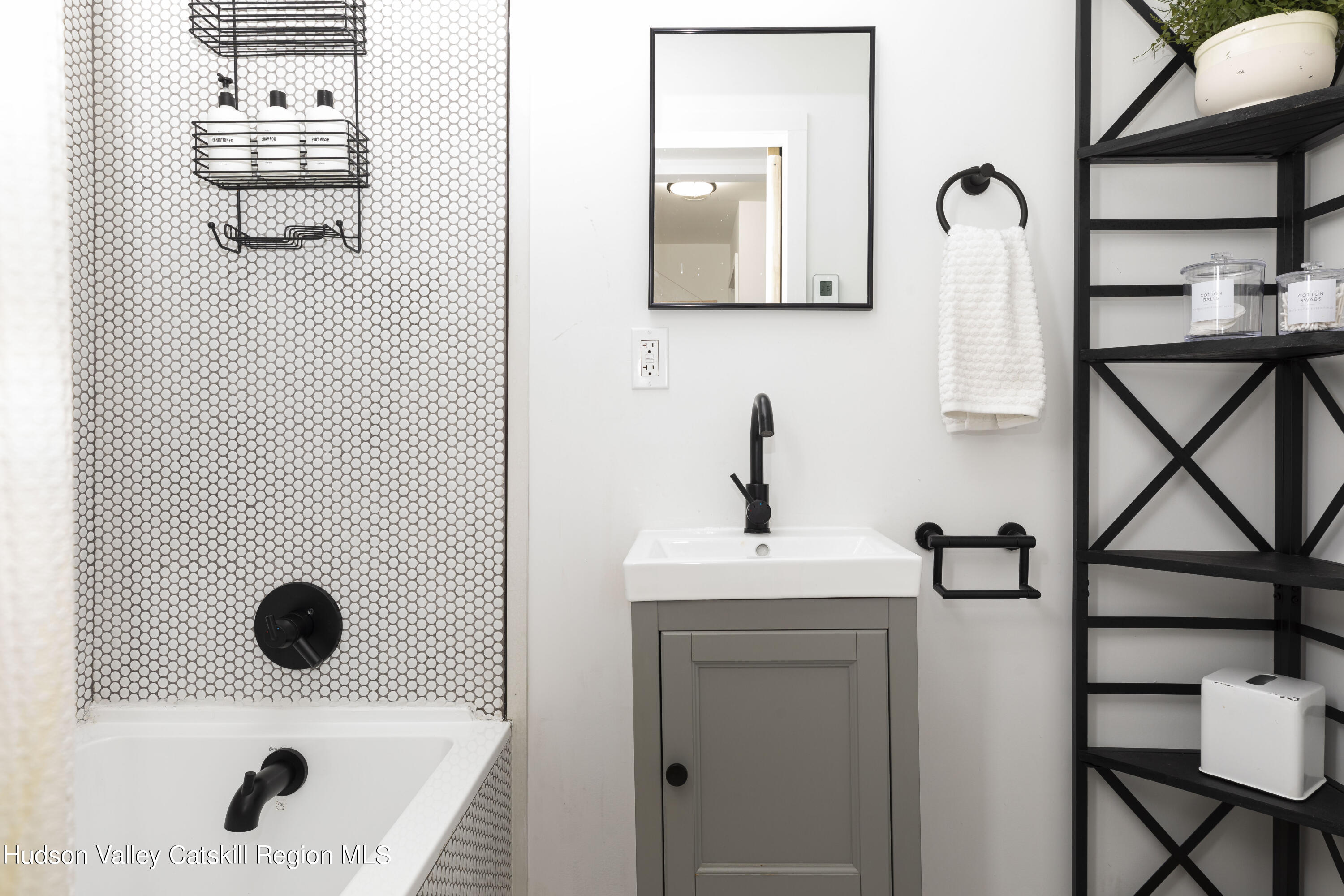 5646 Red Hill Road Claryville, NY 12725 - Photo 22 of 30 a bathroom with a sink and a mirror