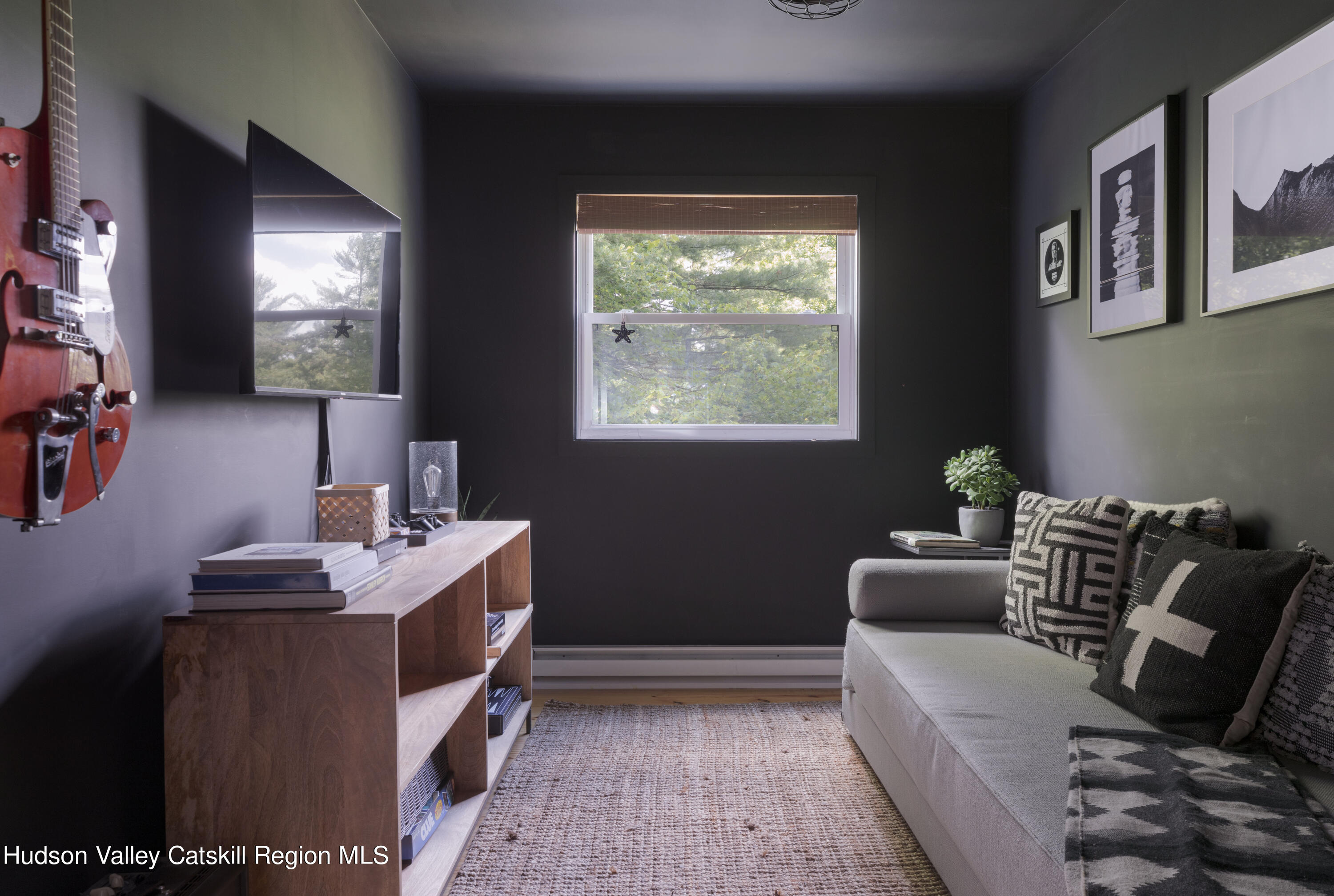 5646 Red Hill Road Claryville, NY 12725 - Photo 23 of 30 a living room with furniture and a window