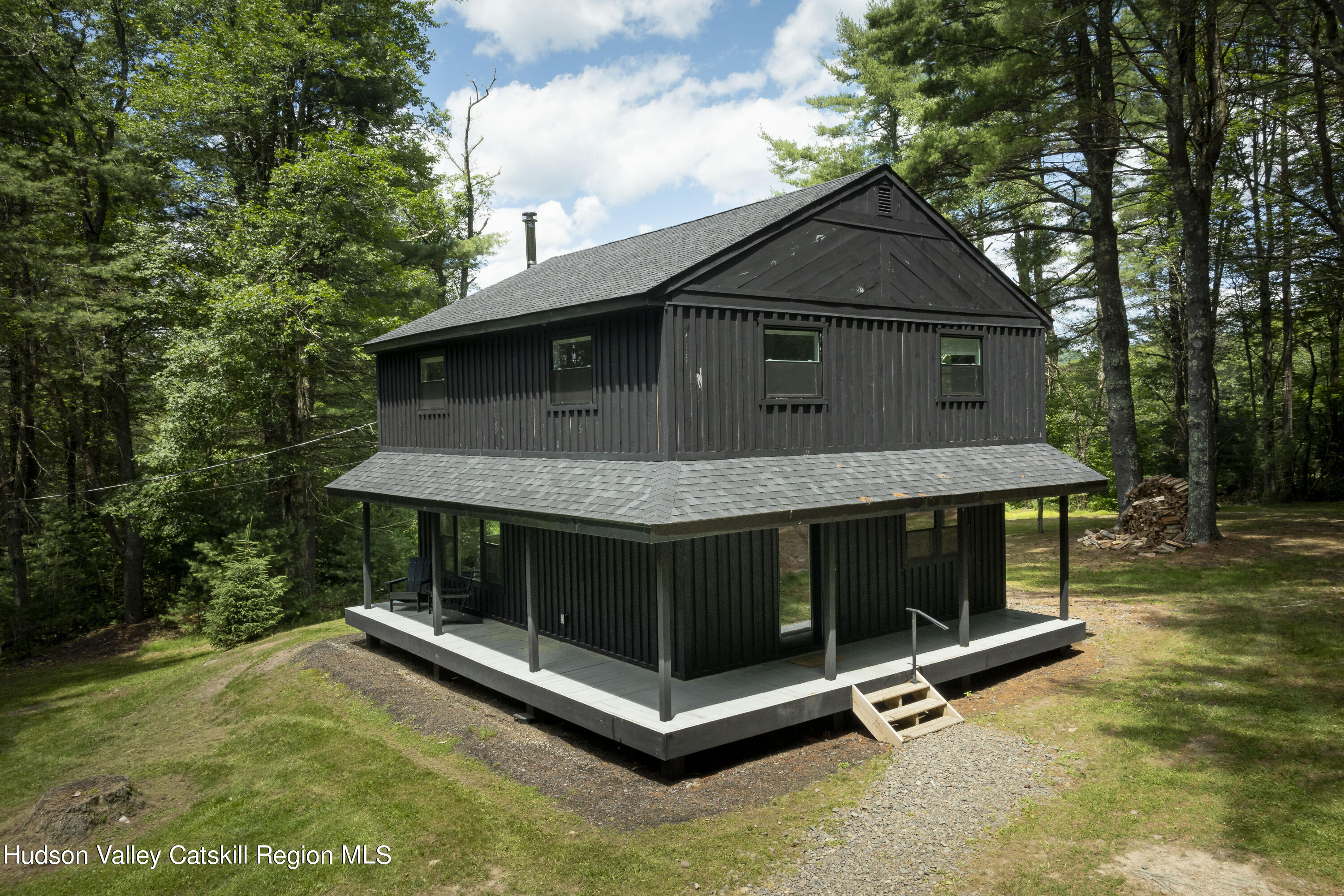 5646 Red Hill Road Claryville, NY 12725 - Photo 27 of 30 a view of backyard with a tub and trees