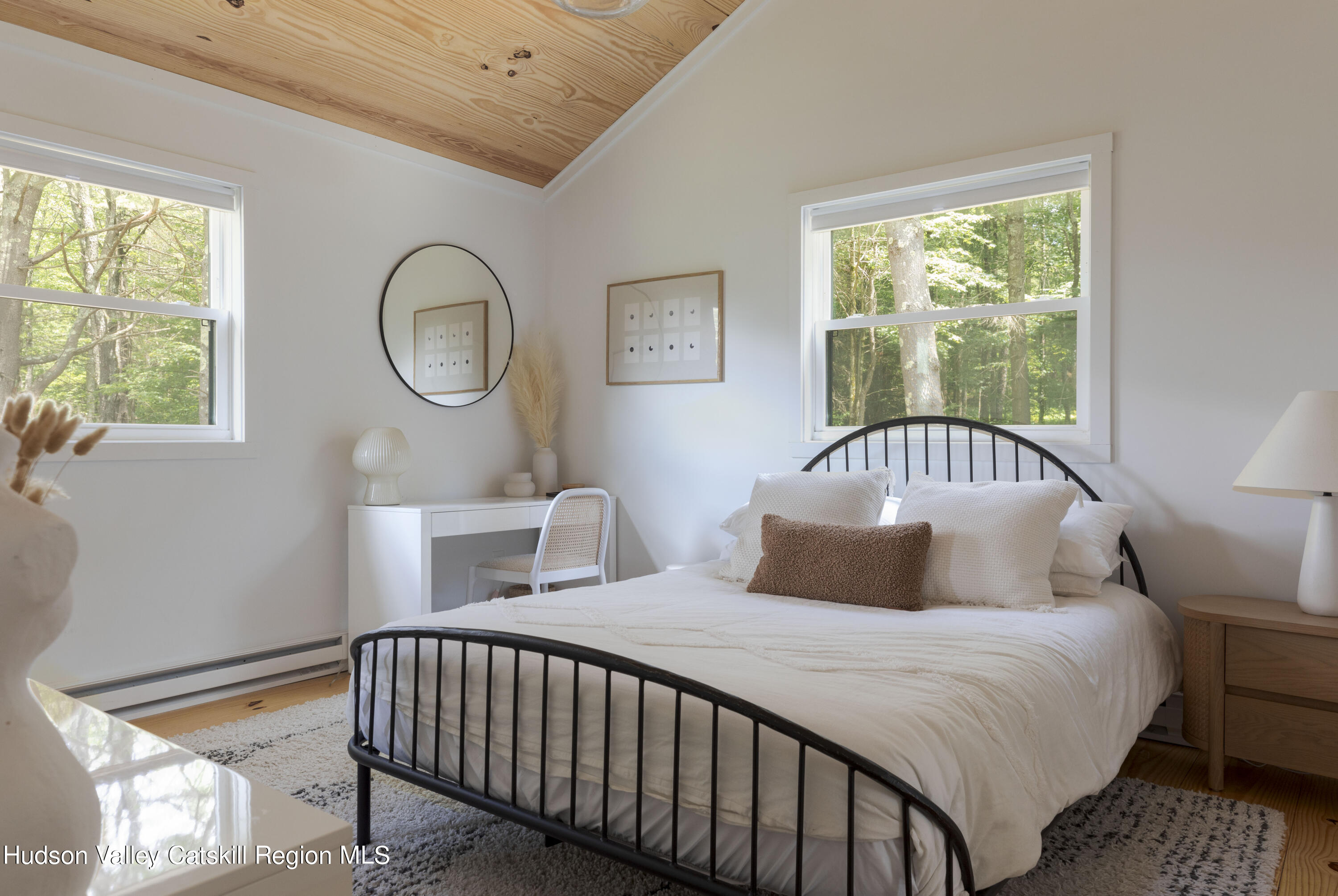 5646 Red Hill Road Claryville, NY 12725 - Photo 6 of 30 a bedroom with a bed and a window