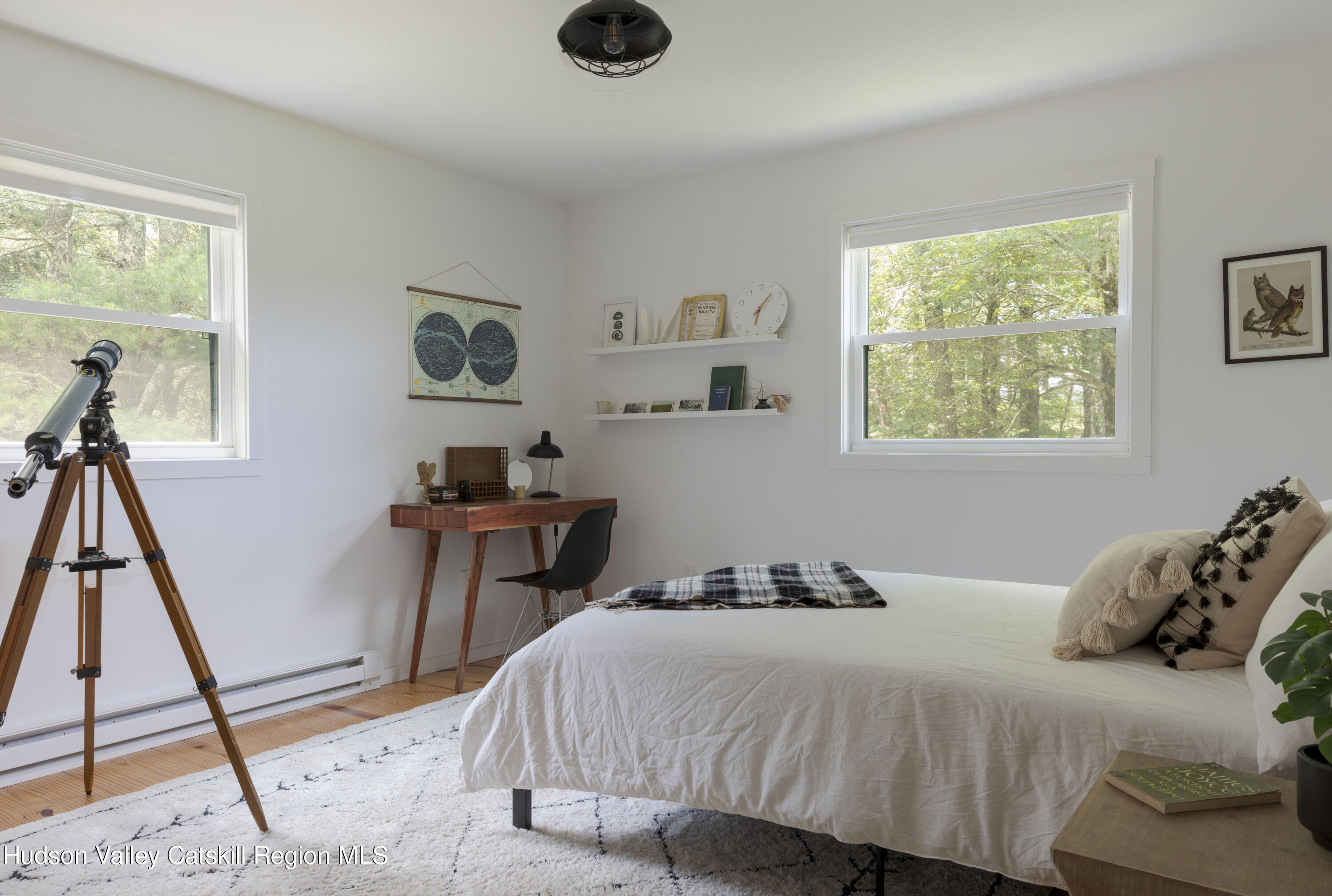 5646 Red Hill Road Claryville, NY 12725 - Photo 8 of 30 a bedroom with a bed and a window