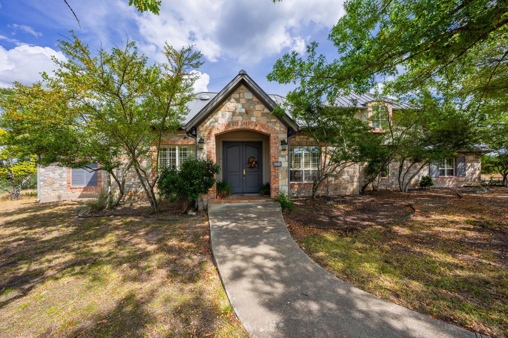 101 Crestline Kerrville, TX 78028 - Photo 1 of 47 a front view of a house with garden