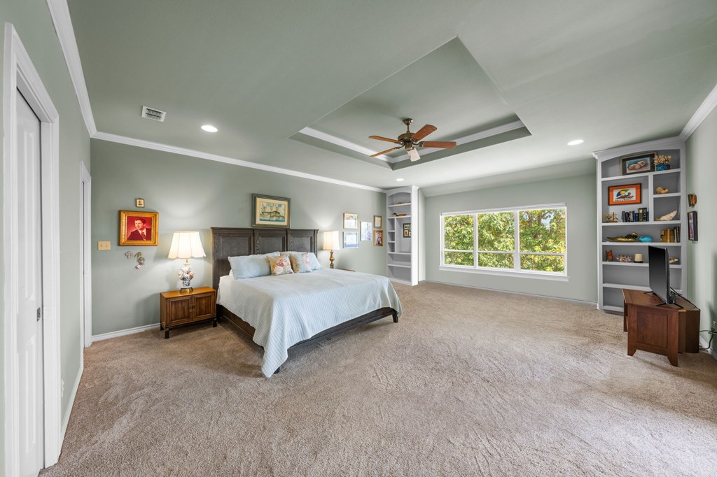 101 Crestline Kerrville, TX 78028 - Photo 15 of 47 a bed room with a bed and a book shelf