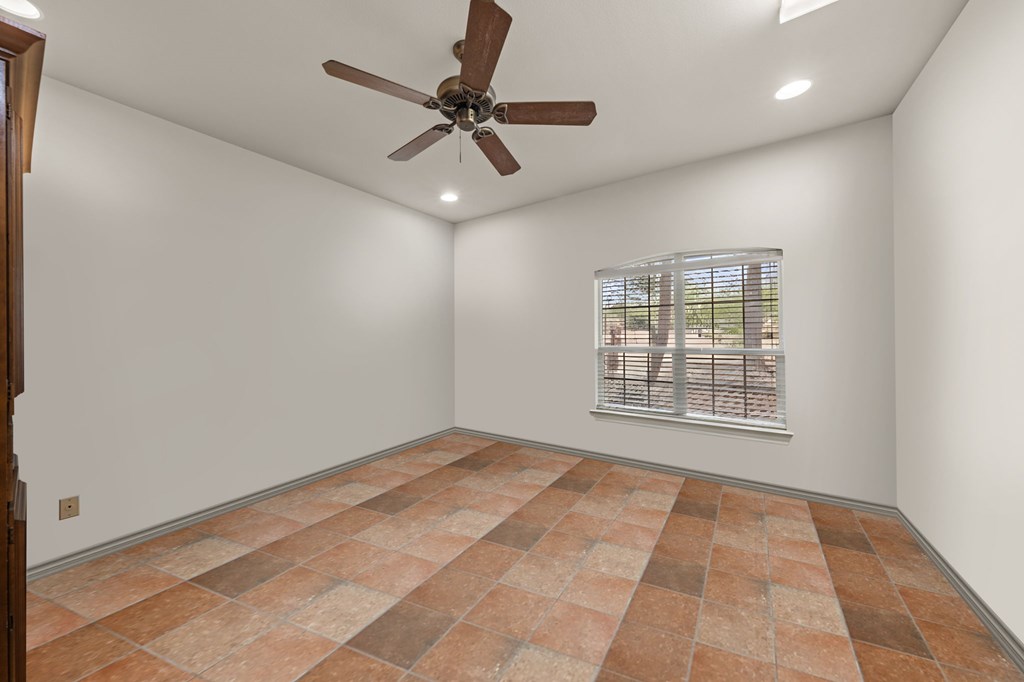 101 Crestline Kerrville, TX 78028 - Photo 21 of 47 a view of an empty room with a window