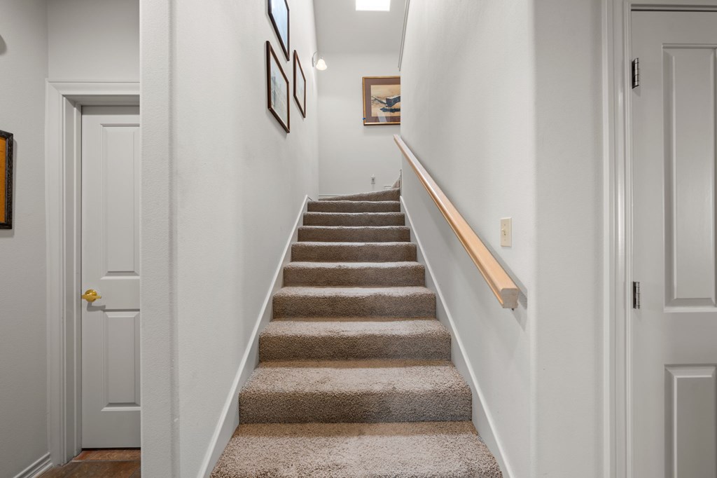 101 Crestline Kerrville, TX 78028 - Photo 23 of 47 a view of staircase with white walls and windows