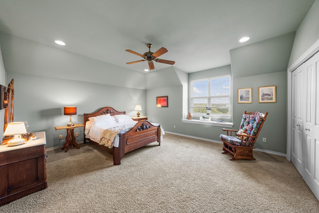 101 Crestline Kerrville, TX 78028 - Photo 26 of 47 a bed room with a bed and a chair