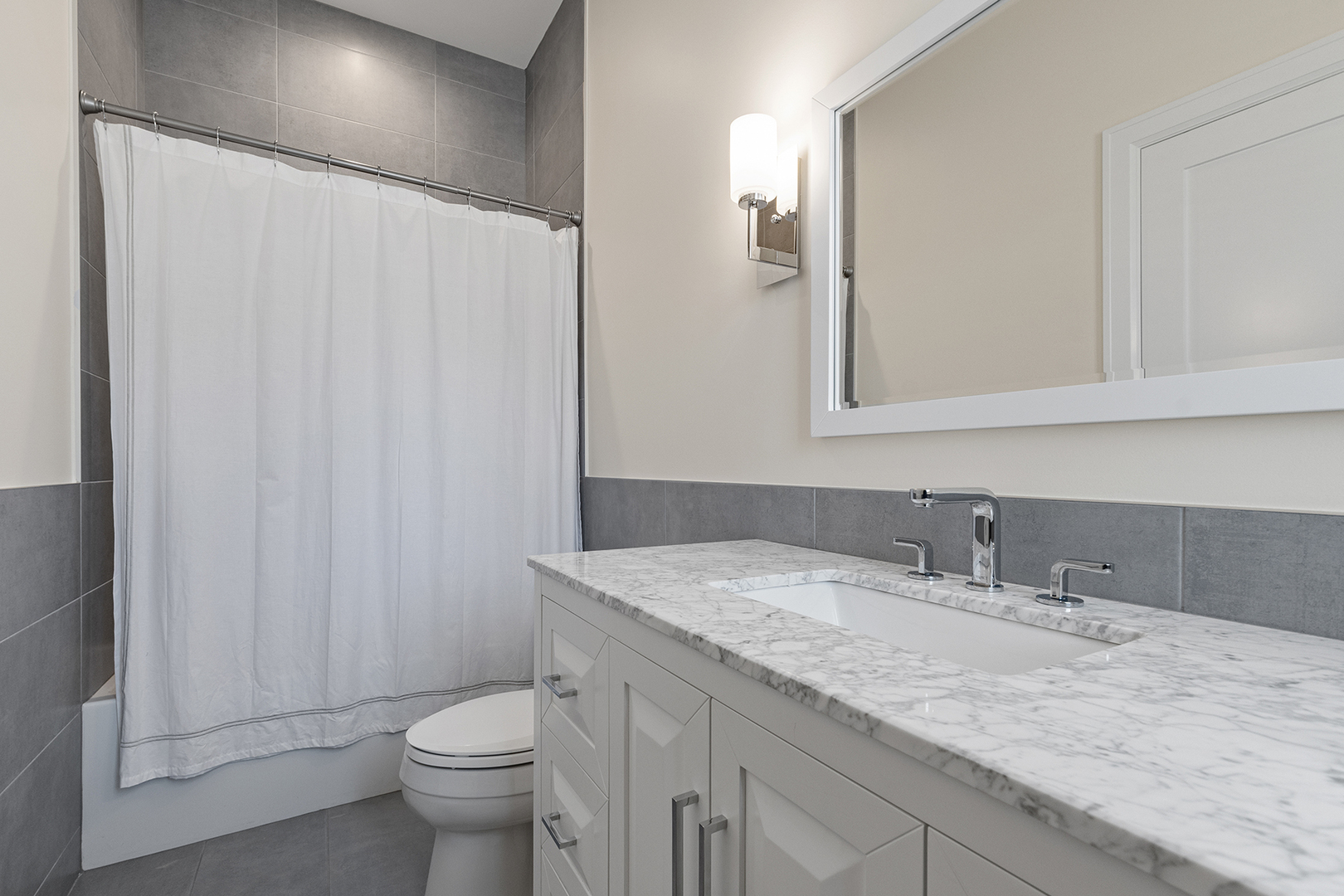 511 Lansdowne Lane Lake Bluff, IL 60044 - Photo 48 of 69 a bathroom with a granite countertop sink and a toilet