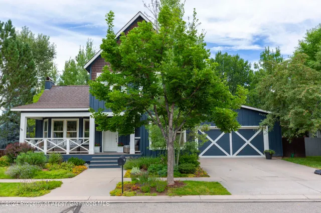 front view of a house with yard
