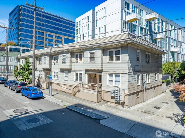 a front view of a building with many windows