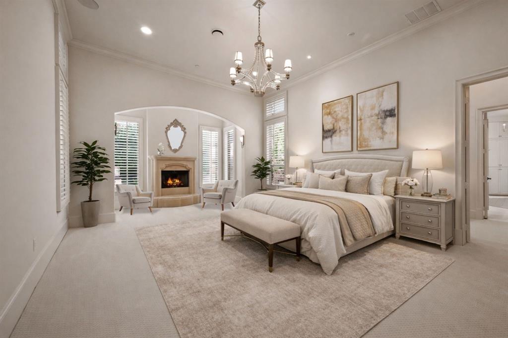 6900 Rockingham Court Colleyville, TX 76034 - Photo 14 of 40 Spacious room featuring vaulted ceilings, a prominent chandelier, an arched alcove with a corner fireplace, and plantation shutters