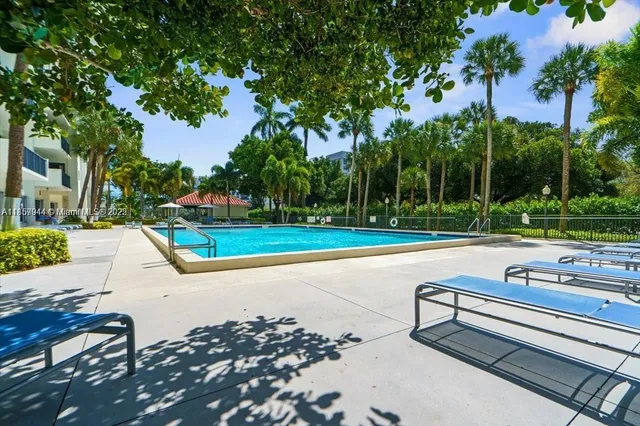 a view of a park with large trees