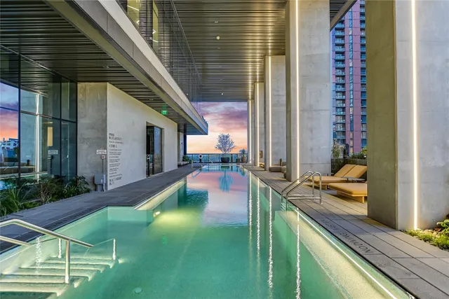 a backyard of a house with outdoor seating