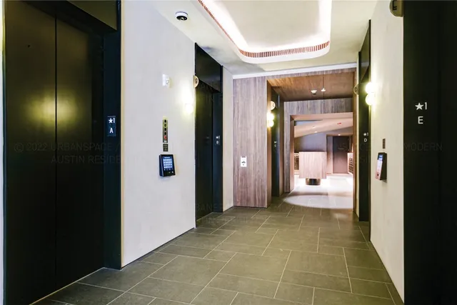 a view of a bathroom with a glass door shower