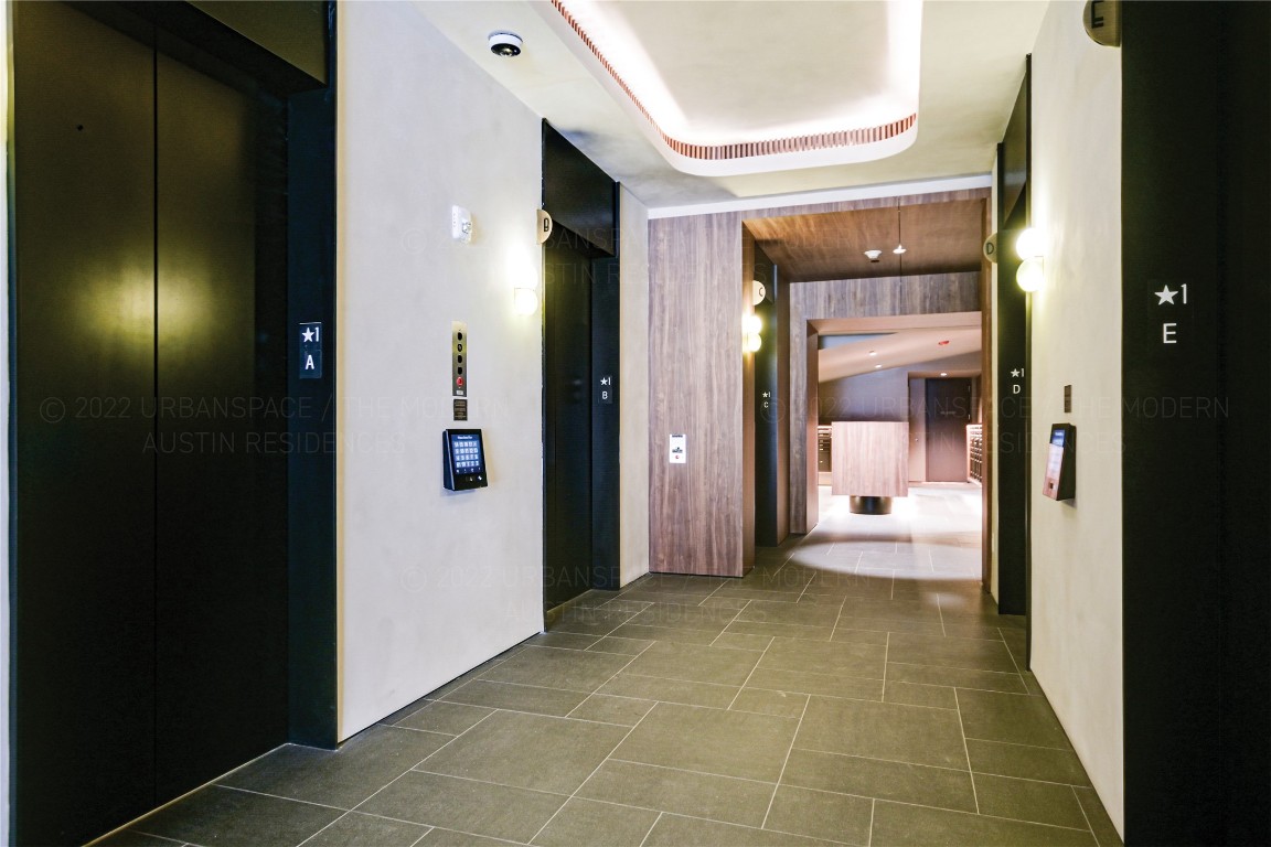 610 Davis Street, Unit 2505 Austin, TX 78701 - Photo 22 of 31 a view of a bathroom with a glass door shower