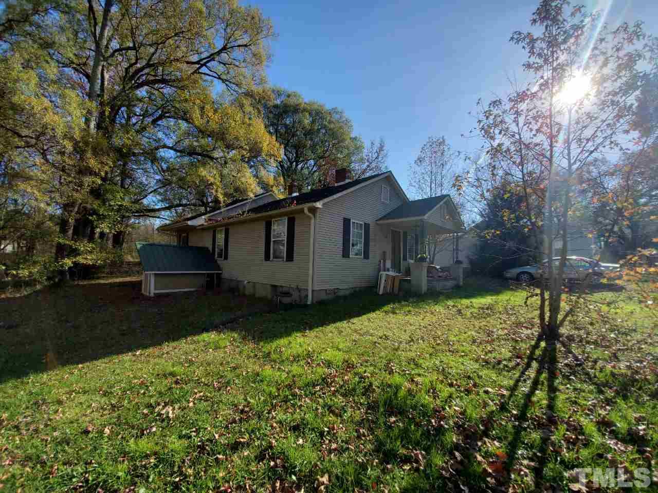 97 Allie Clay Road Roxboro, NC 27573 - Photo 4 of 20 a view of backyard of house with green space