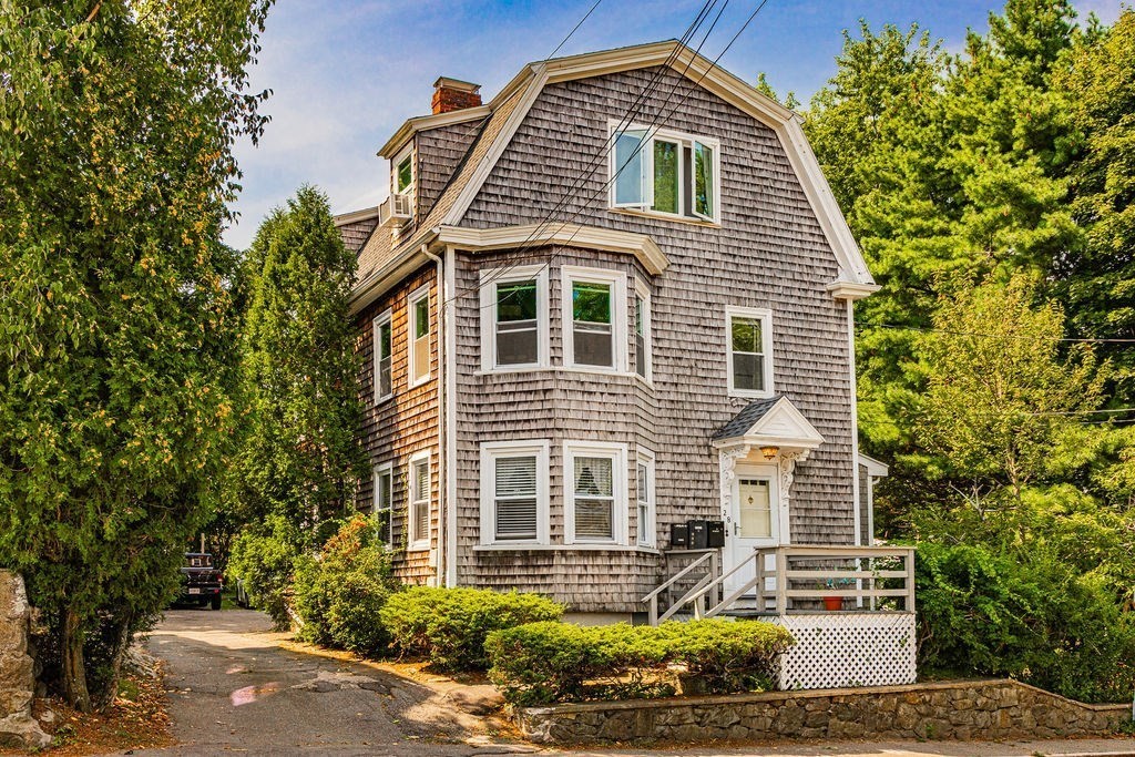 28 Village Street, Unit 2 Marblehead, MA 01945 - Photo 1 of 16 a front view of a house with a yard
