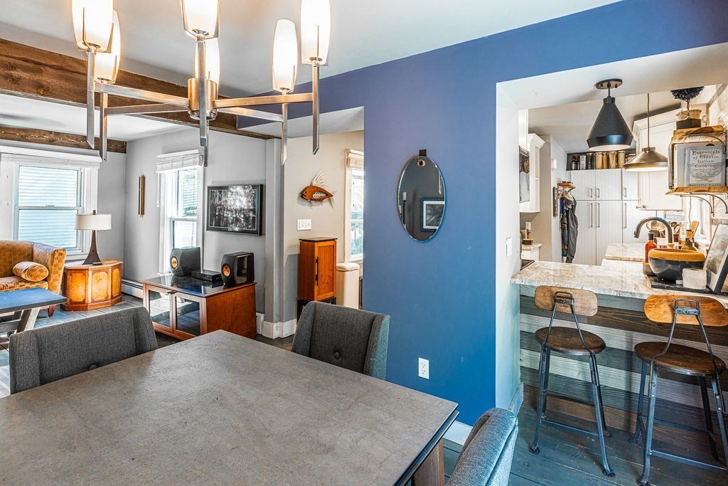 28 Village Street, Unit 2 Marblehead, MA 01945 - Photo 5 of 16 a view of a livingroom with furniture and window