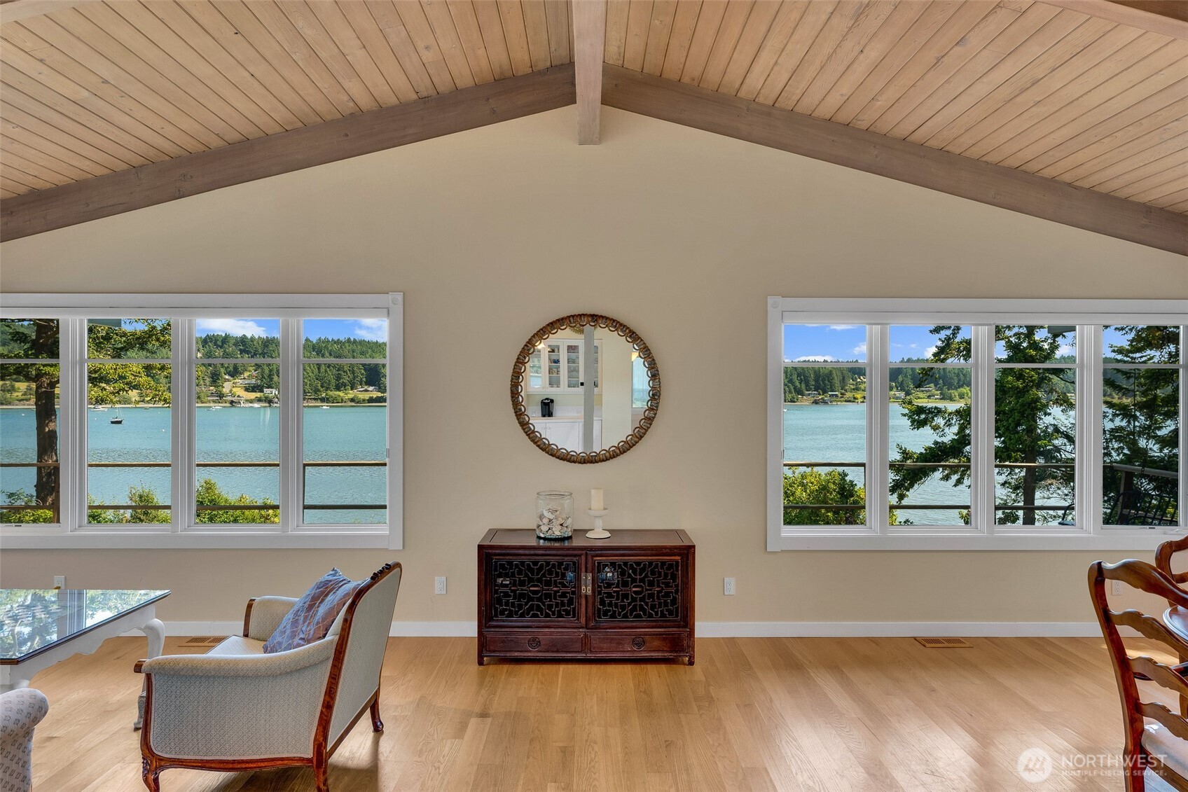 1794 Bayshore Road Lopez Island, WA 98261 - Photo 13 of 39 a living room with furniture a window and a flat screen tv