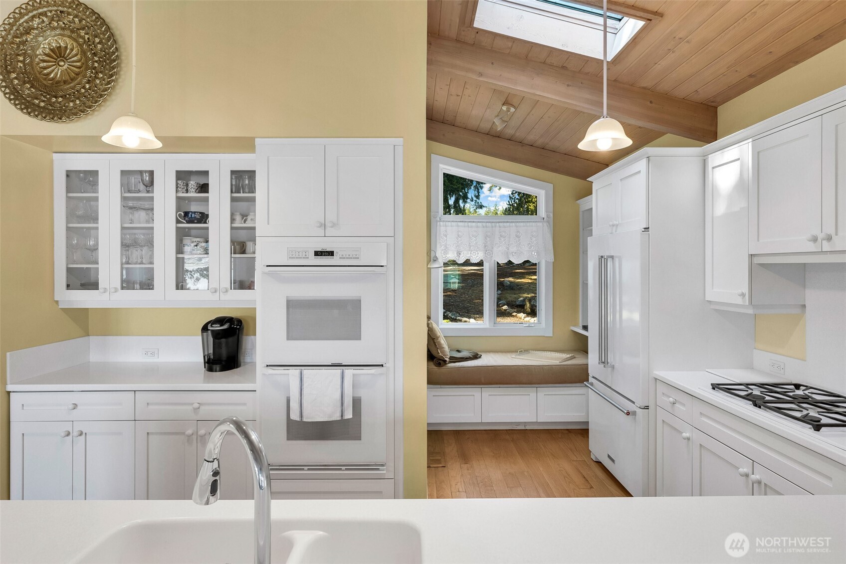 1794 Bayshore Road Lopez Island, WA 98261 - Photo 20 of 39 a kitchen with a stove a refrigerator and a sink