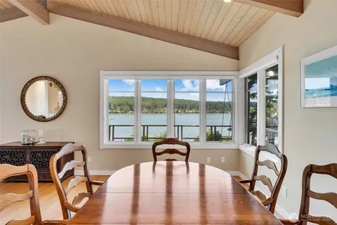 a view of a workspace with furniture window and outside view