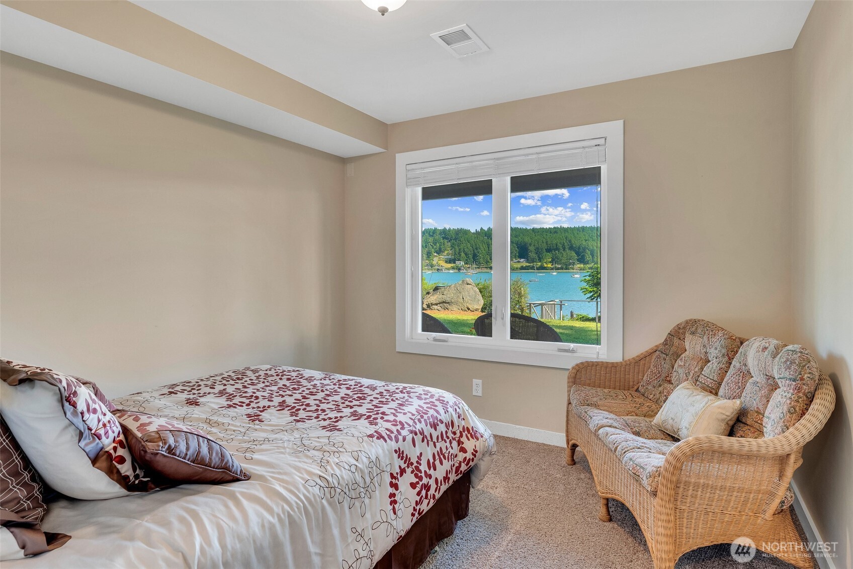 1794 Bayshore Road Lopez Island, WA 98261 - Photo 31 of 39 a bedroom with two beds and a large window