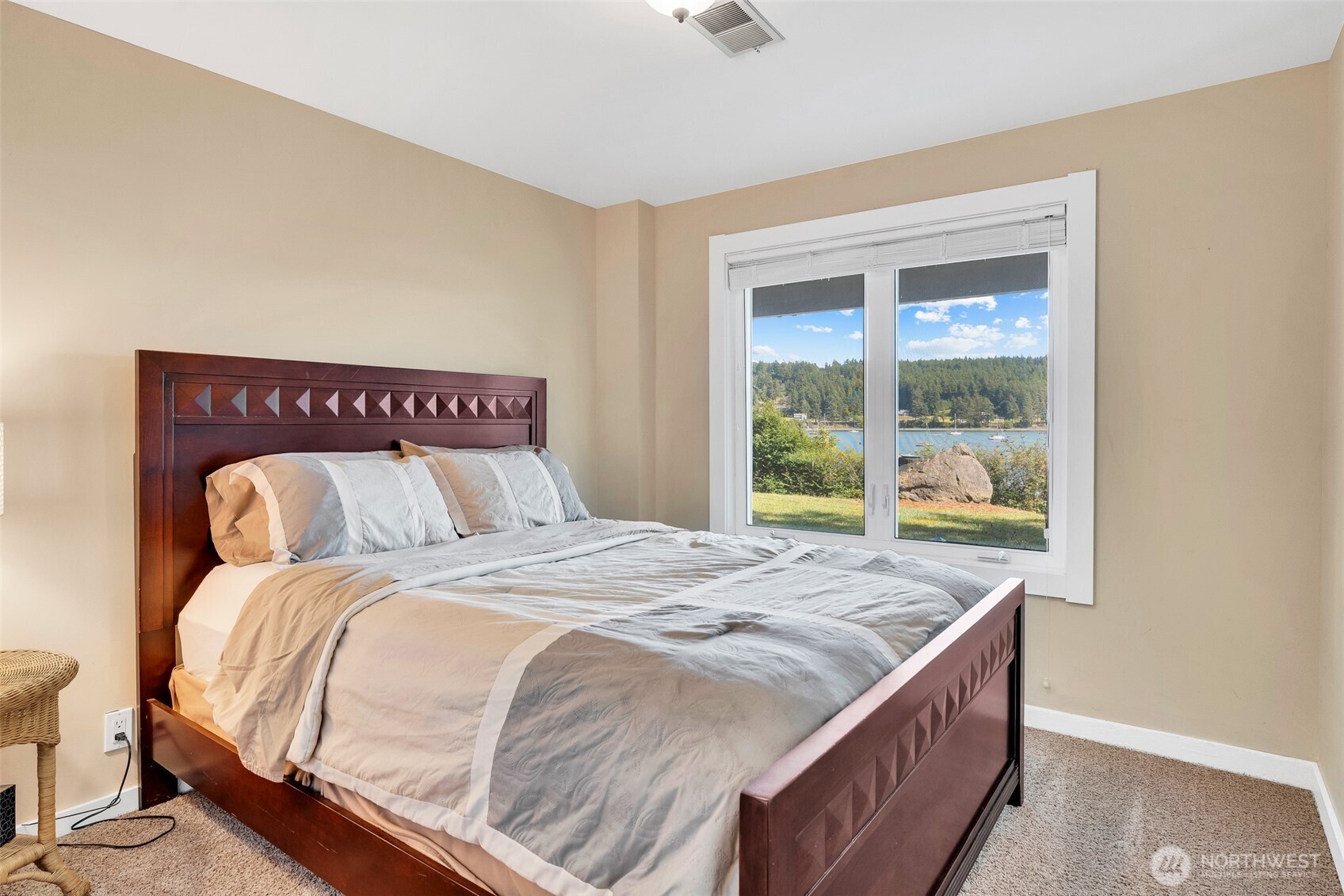 1794 Bayshore Road Lopez Island, WA 98261 - Photo 32 of 39 a bedroom with a bed and a window