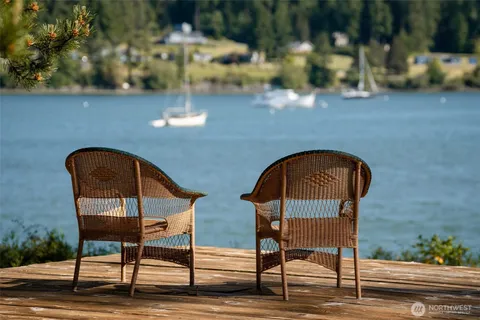 a view of a chairs in front of house