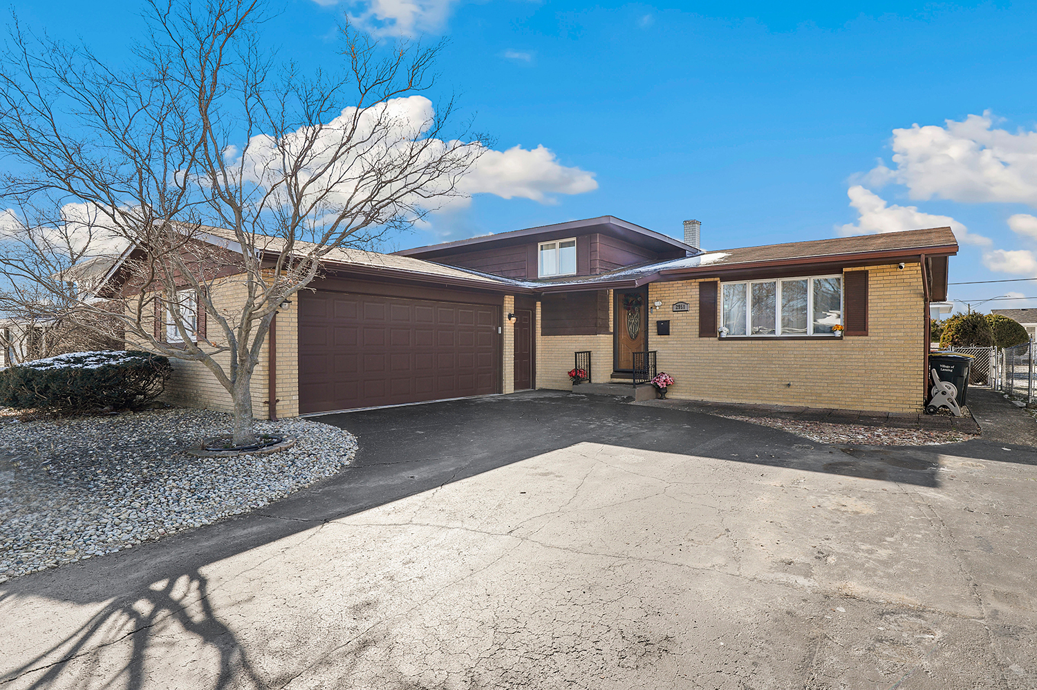 2951 193rd Street Lansing, IL 60438 - Photo 1 of 17 a view of a house with a yard