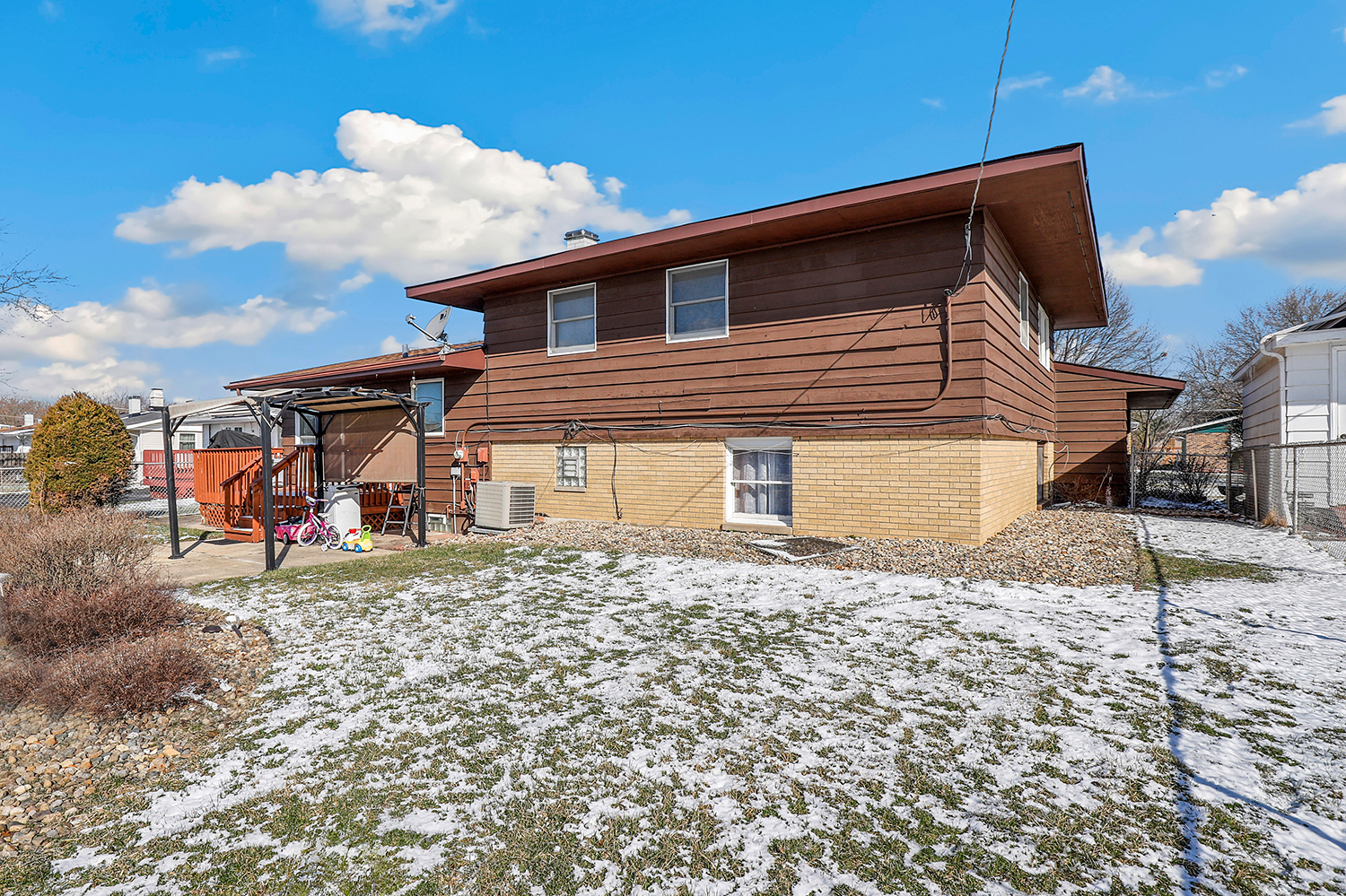 2951 193rd Street Lansing, IL 60438 - Photo 16 of 17 a front view of a house with a yard