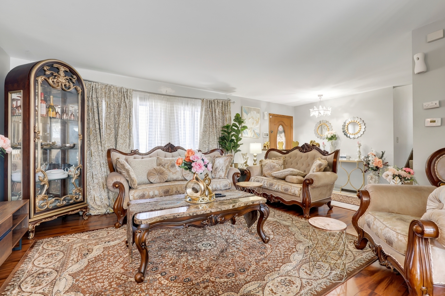 2951 193rd Street Lansing, IL 60438 - Photo 2 of 17 a living room with furniture and a window