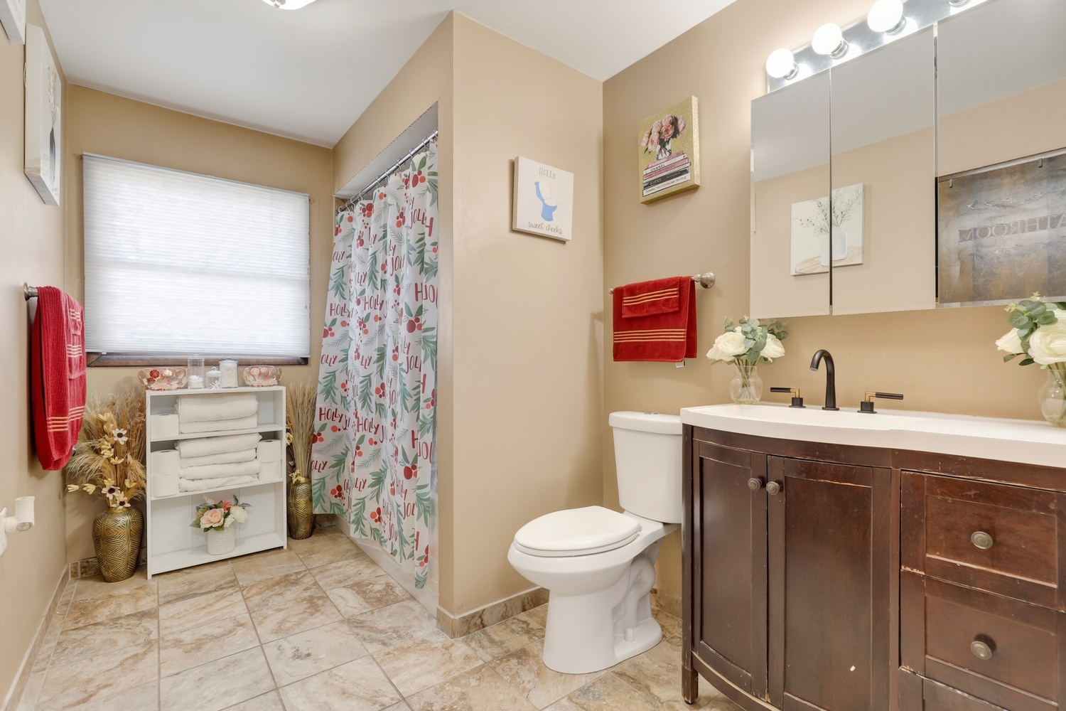 2951 193rd Street Lansing, IL 60438 - Photo 8 of 17 a bathroom with a sink toilet and shower