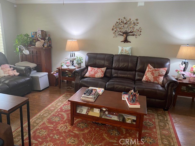 1051 Site Drive, Unit 281 Brea, CA 92821 - Photo 13 of 42 a living room with furniture a lamp and a potted plant