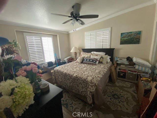 1051 Site Drive, Unit 281 Brea, CA 92821 - Photo 22 of 42 a bedroom with a bed and a window