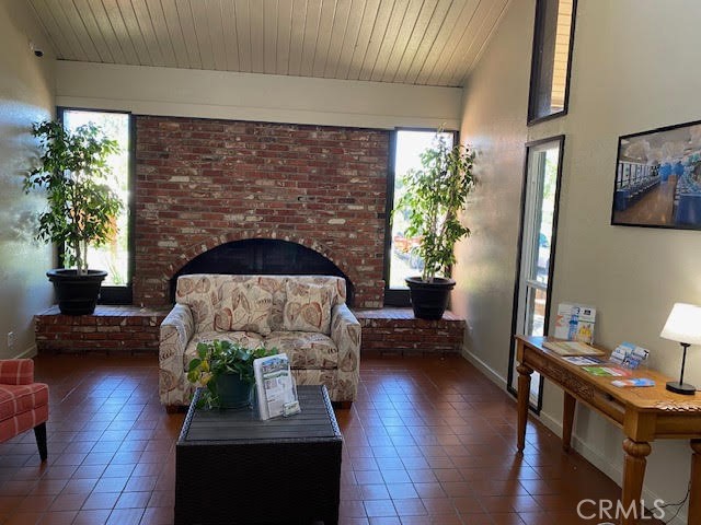 1051 Site Drive, Unit 281 Brea, CA 92821 - Photo 40 of 42 a living room with furniture and a fireplace