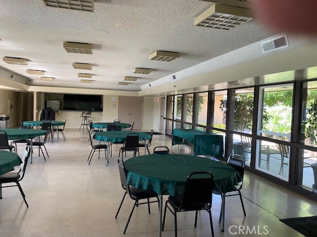 1051 Site Drive, Unit 281 Brea, CA 92821 - Photo 42 of 42 a view of a dining room with furniture window and outside view
