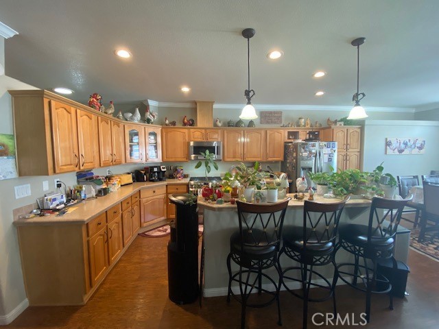 1051 Site Drive, Unit 281 Brea, CA 92821 - Photo 9 of 42 a large kitchen with a table and chairs