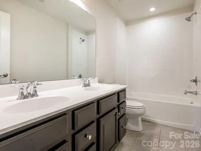 a house with trees in the background