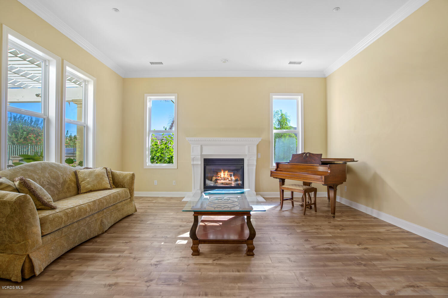477 Vineyard Drive Simi Valley, CA 93065 - Photo 11 of 65 a living room with furniture and a fireplace