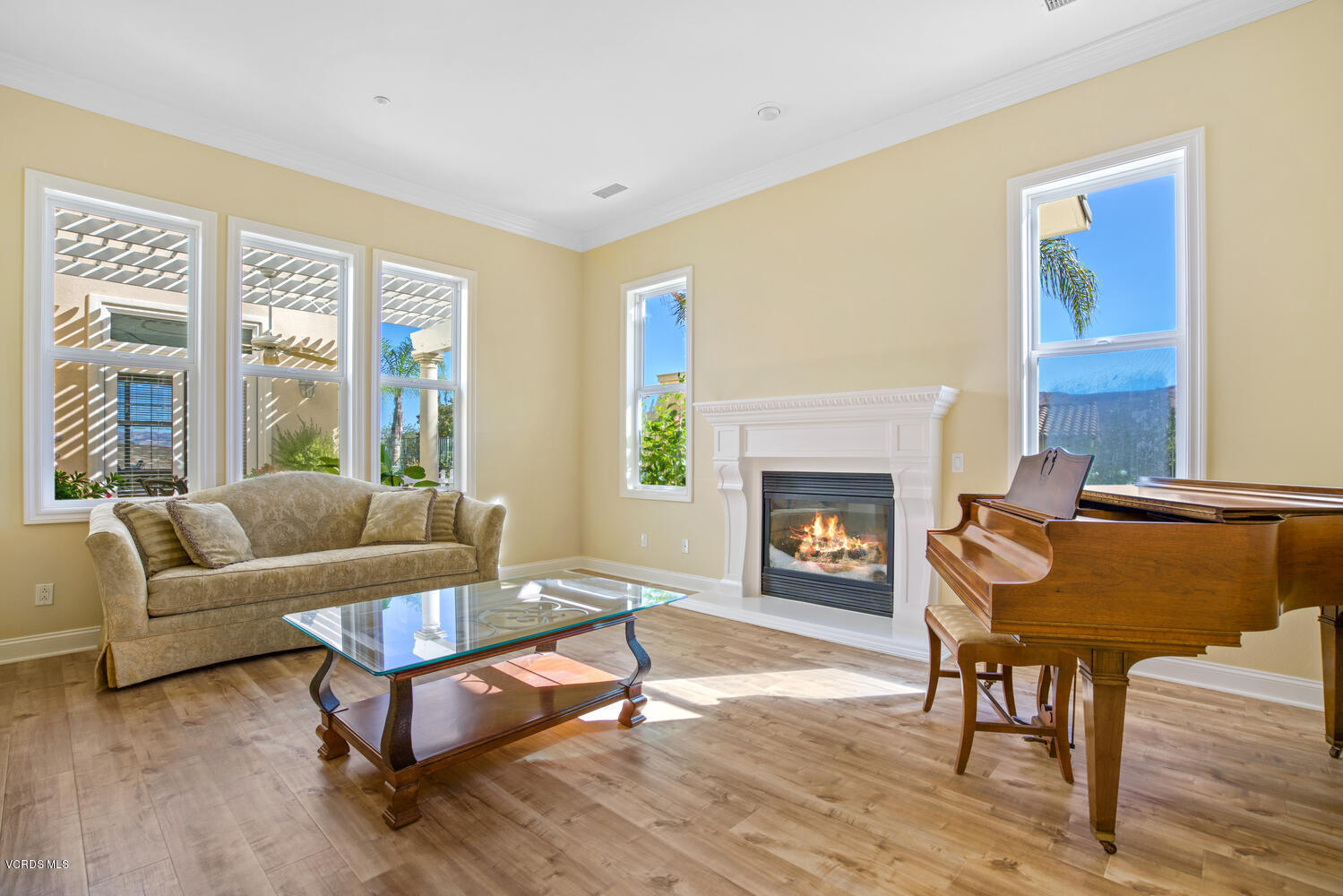 477 Vineyard Drive Simi Valley, CA 93065 - Photo 12 of 65 a living room with furniture and a fireplace