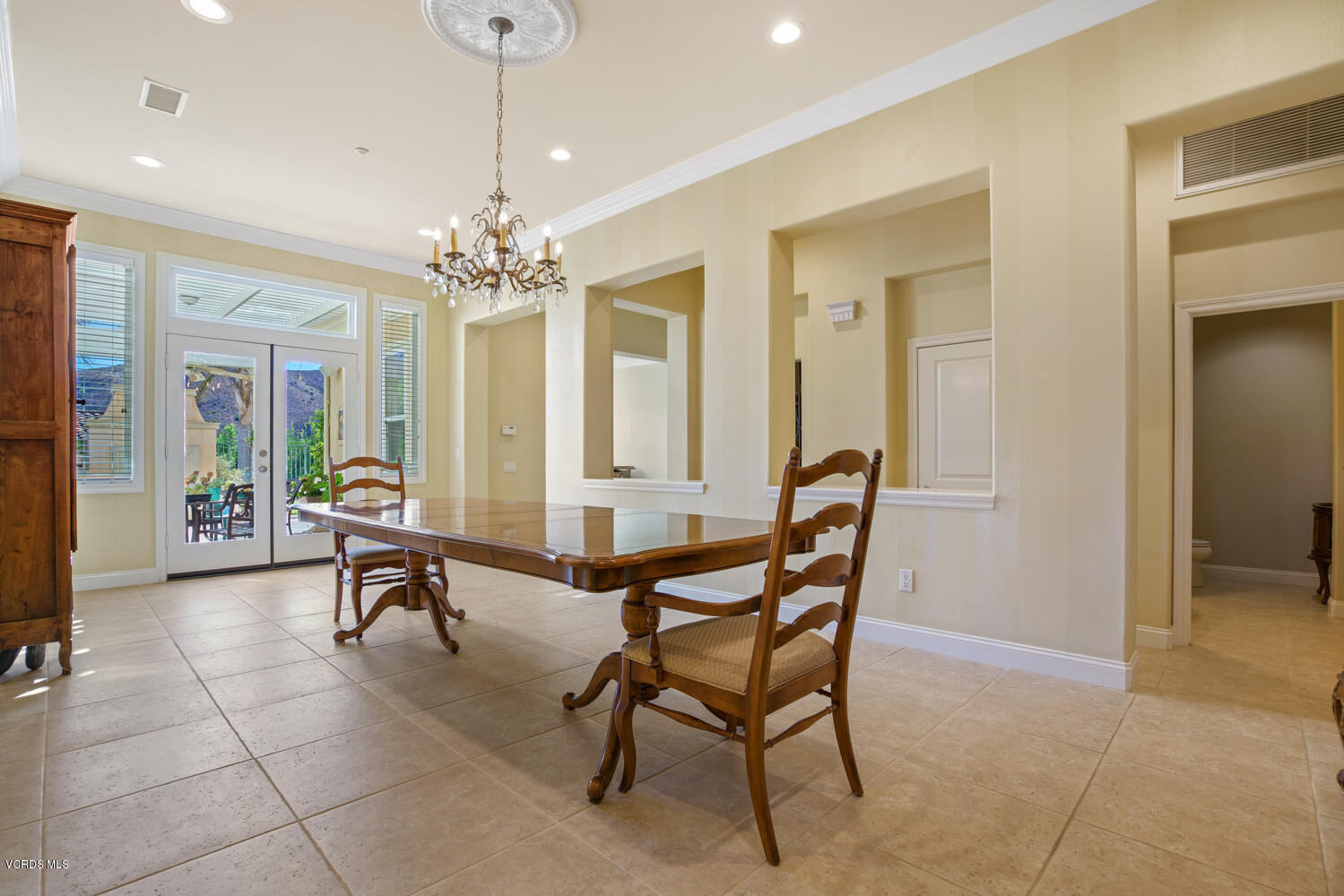 477 Vineyard Drive Simi Valley, CA 93065 - Photo 16 of 65 a view of a livingroom with furniture and a chandelier