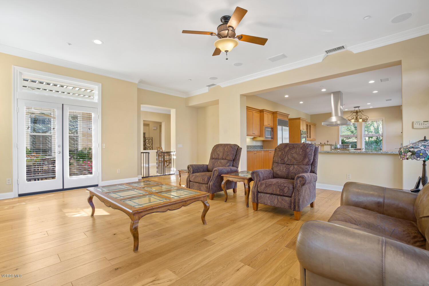 477 Vineyard Drive Simi Valley, CA 93065 - Photo 20 of 65 a living room with furniture and a wooden floor
