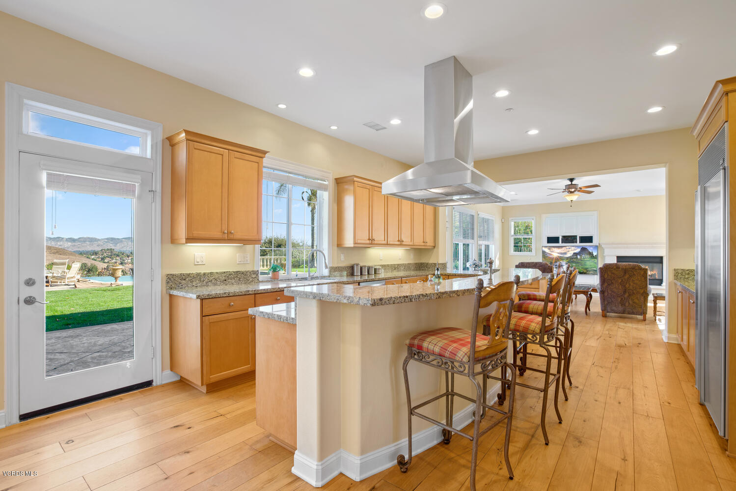 477 Vineyard Drive Simi Valley, CA 93065 - Photo 26 of 65 a kitchen with stainless steel appliances granite countertop a kitchen island a stove a cabinets and a sink