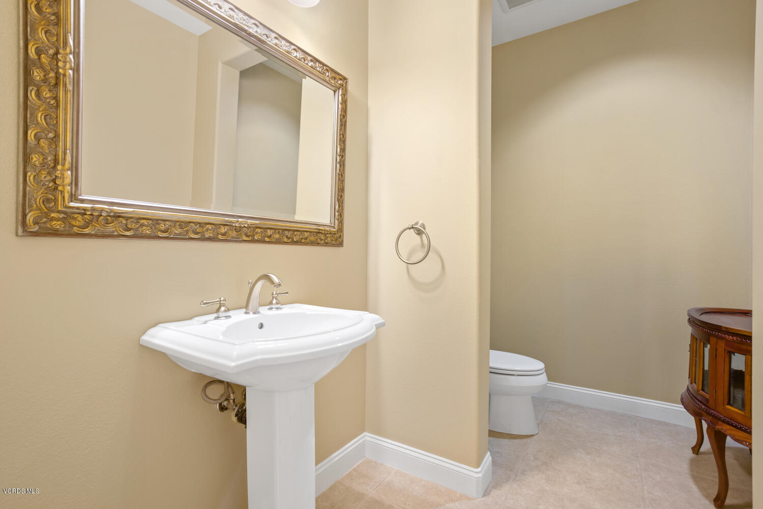 477 Vineyard Drive Simi Valley, CA 93065 - Photo 28 of 65 a bathroom with a sink and a mirror