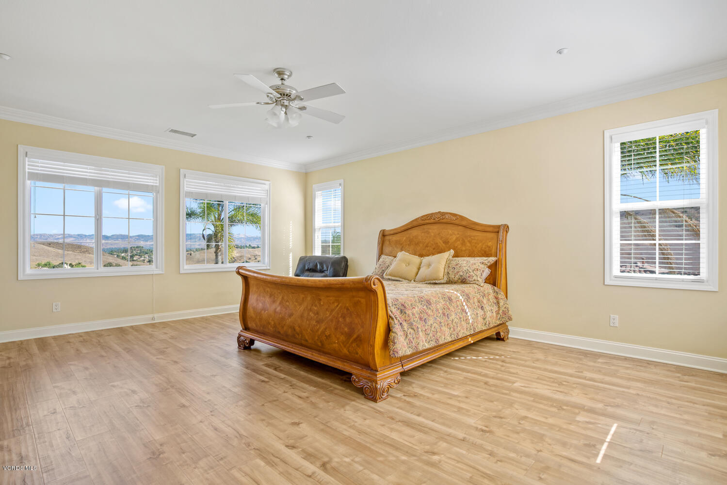 477 Vineyard Drive Simi Valley, CA 93065 - Photo 38 of 65 a living room with a bed furniture and a window