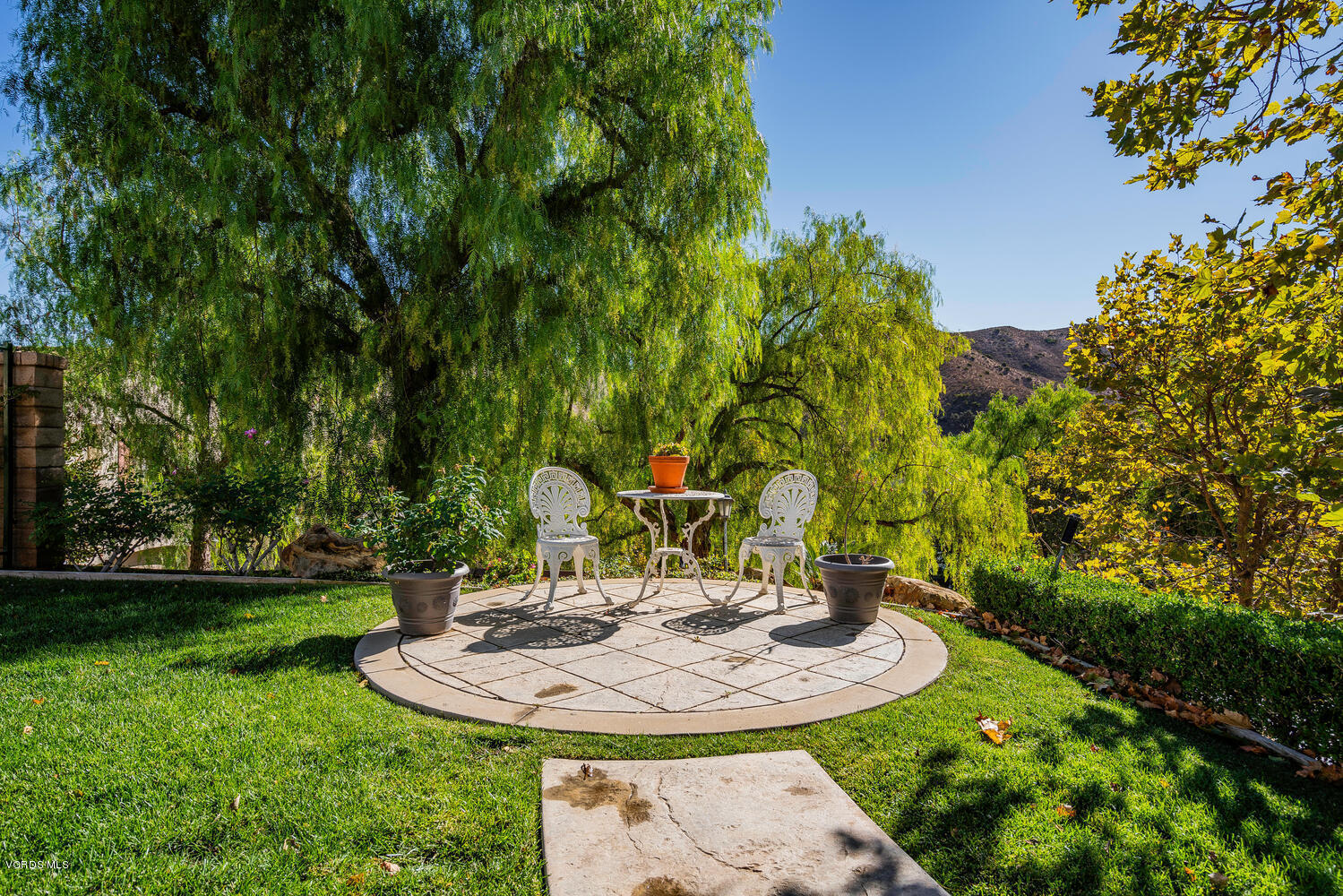 477 Vineyard Drive Simi Valley, CA 93065 - Photo 53 of 65 a view of a swimming pool with a yard