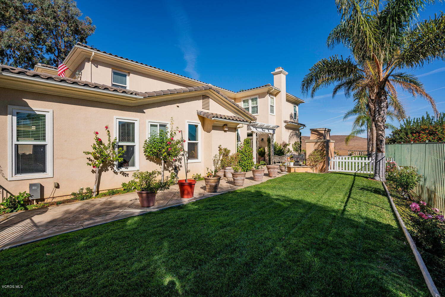 477 Vineyard Drive Simi Valley, CA 93065 - Photo 55 of 65 a front view of house with yard and outdoor seating