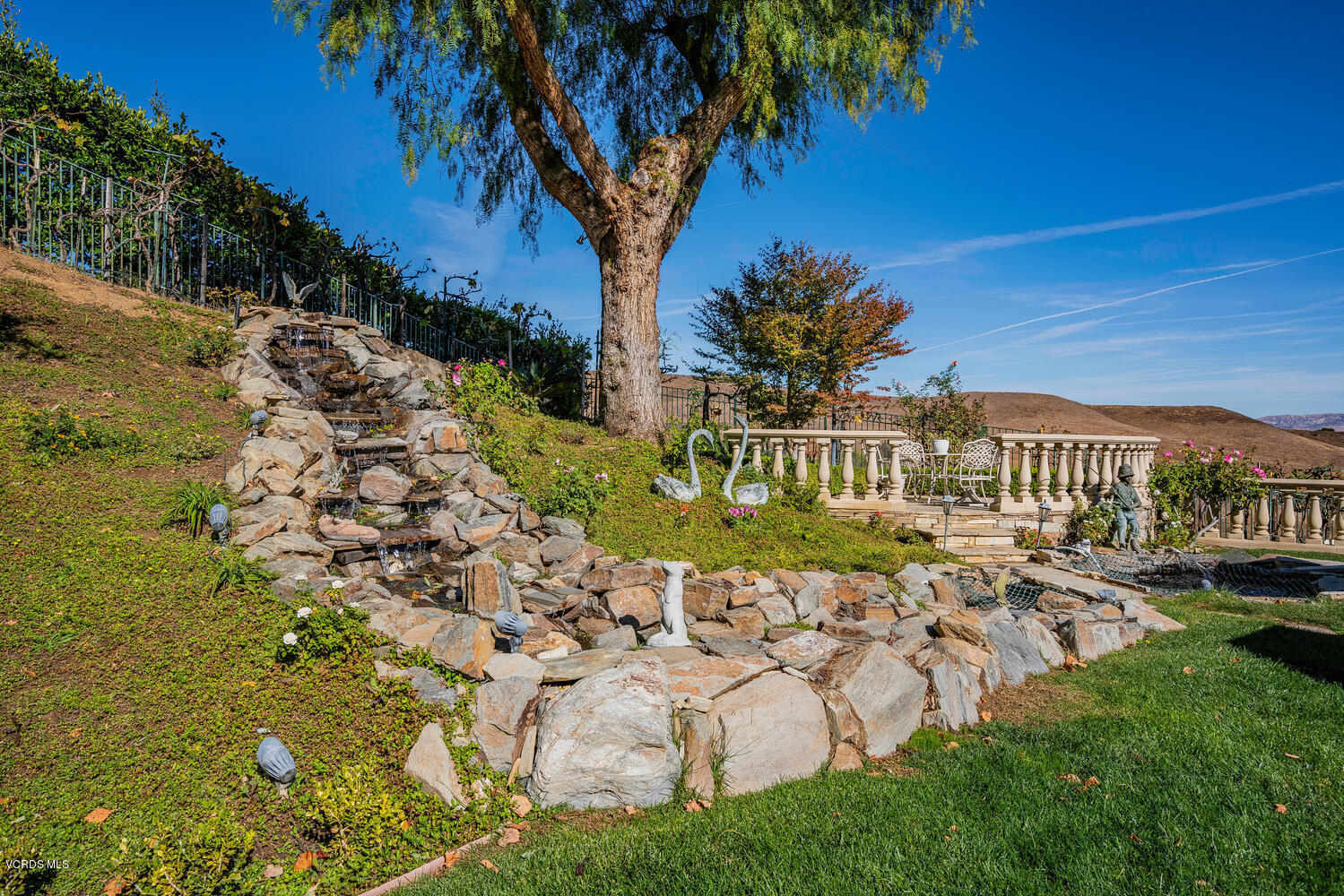 477 Vineyard Drive Simi Valley, CA 93065 - Photo 60 of 65 a view of a house with a yard