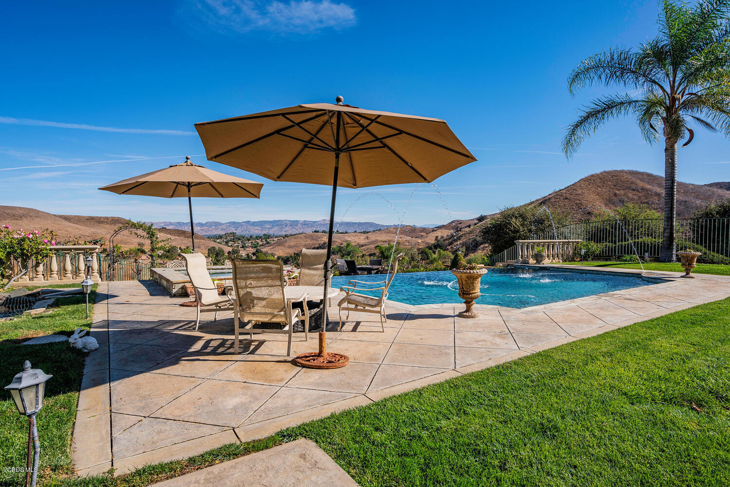 477 Vineyard Drive Simi Valley, CA 93065 - Photo 61 of 65 a view of a backyard with sitting area