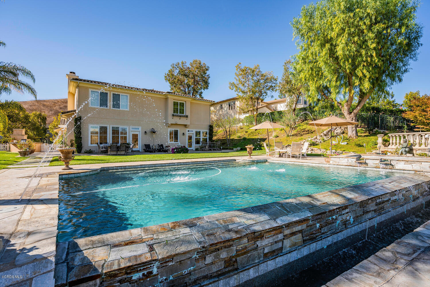 477 Vineyard Drive Simi Valley, CA 93065 - Photo 64 of 65 a view of a house with a yard