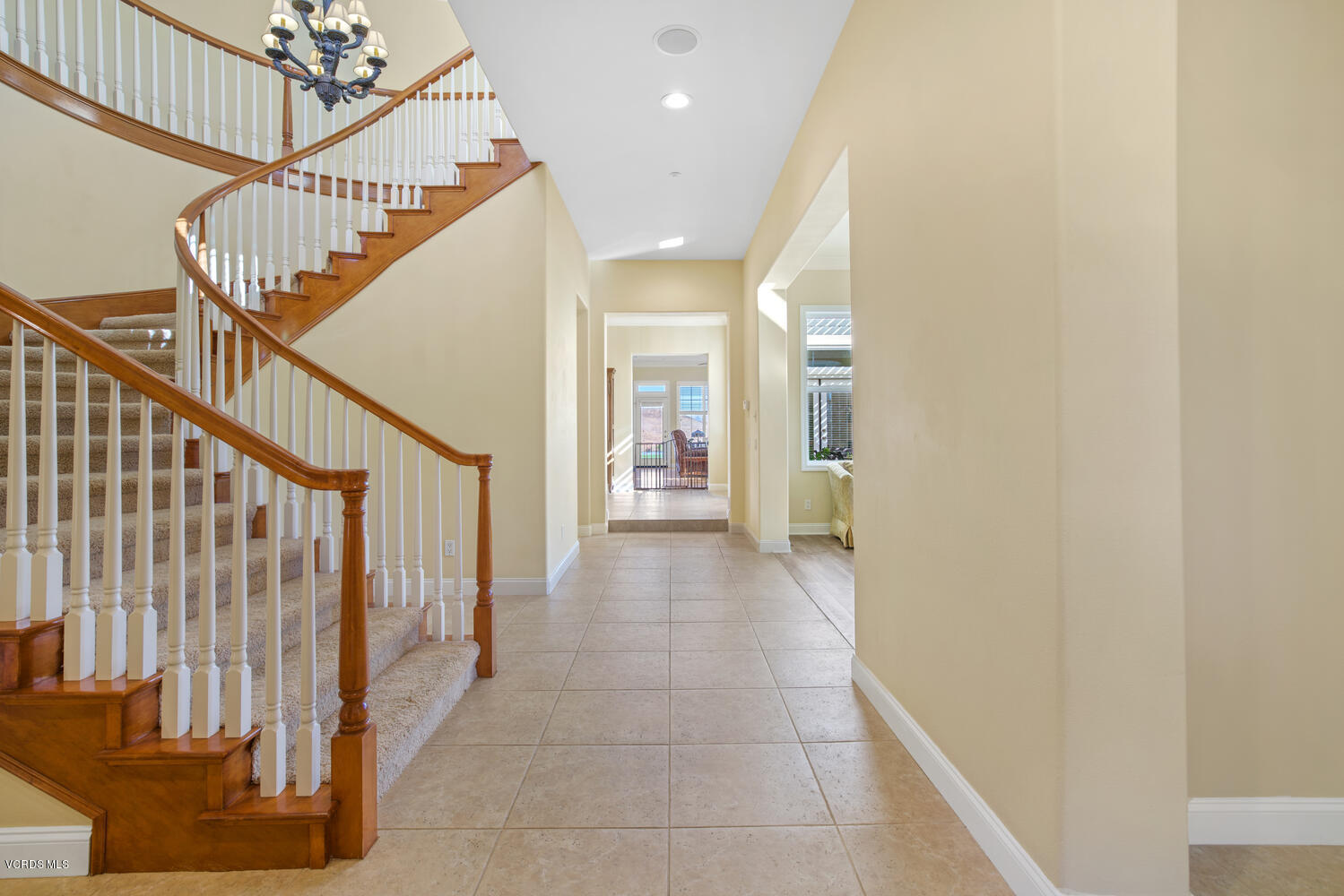 477 Vineyard Drive Simi Valley, CA 93065 - Photo 9 of 65 a view of a hallway with wooden floor and entryway